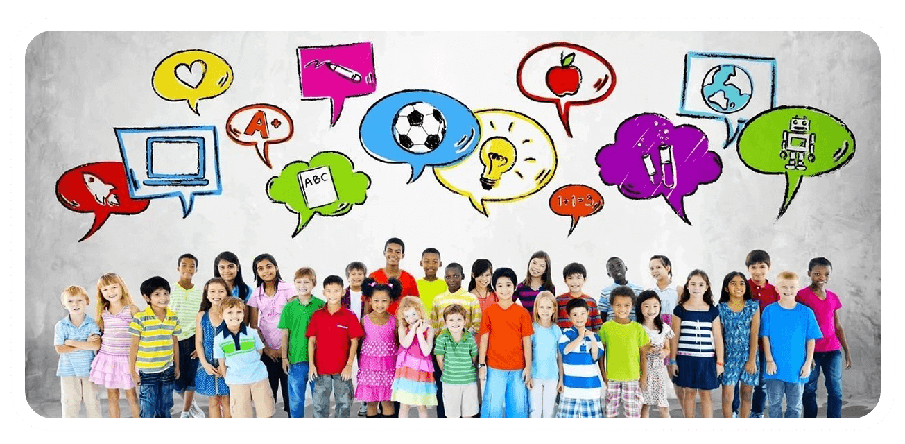 A group of children standing in front of a wall with speech bubbles.